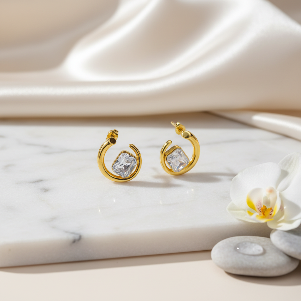 Gold-tone hoop earrings in luxurious setting